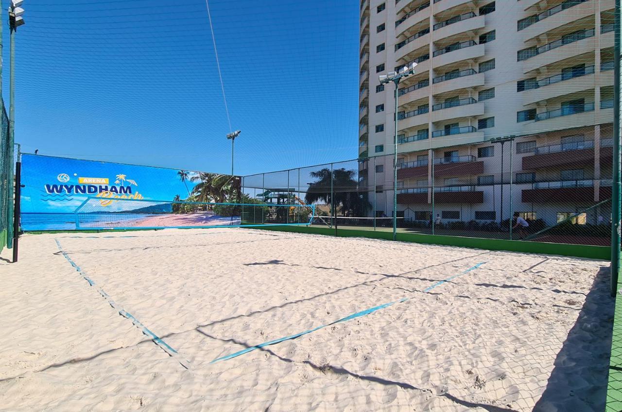 Wyndham Olimpia Royal Hotels Exterior foto The Wynham Beach Volleyball Courts